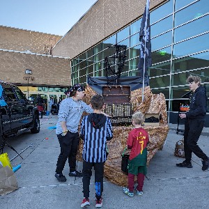 Students in front of Pirate ship